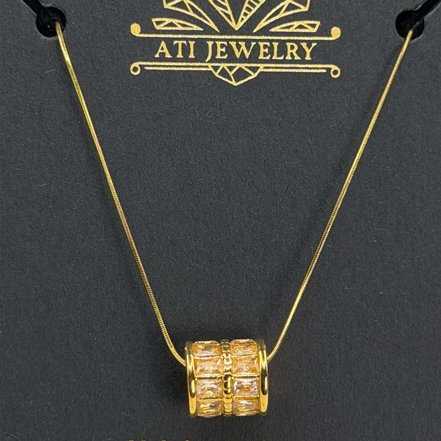 The Crystal Barrel Necklace in 18K Gold Finish with clear faceted crystals
