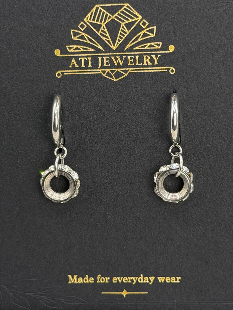 The Gramophone Earrings in Polished Stainless Steel with clear crystal circular drops