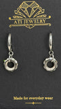 The Gramophone Earrings in Polished Stainless Steel with clear crystal circular drops
