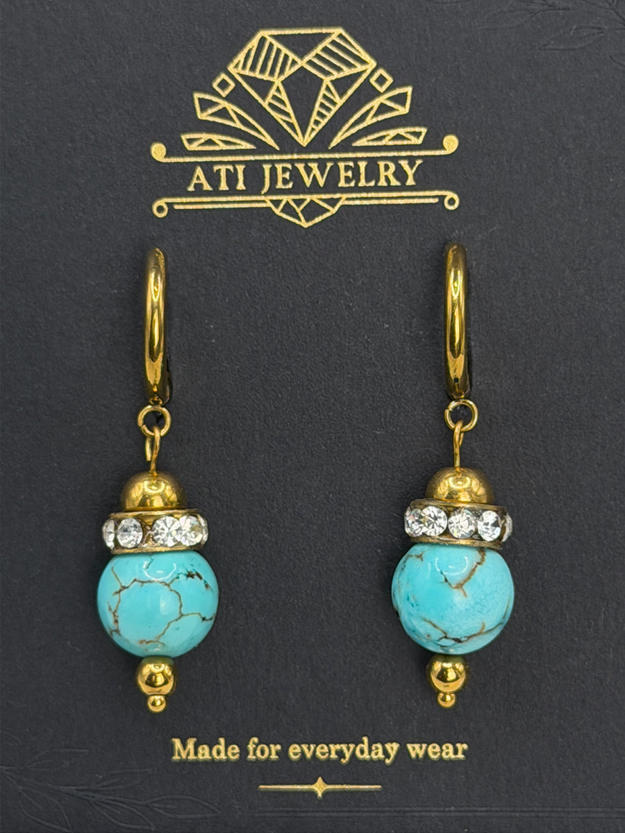 The Duchess Drop Earrings in 18K Gold Finish with turquoise-toned beads and crystal accents