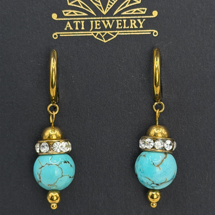 The Duchess Drop Earrings in 18K Gold Finish with turquoise-toned beads and crystal accents