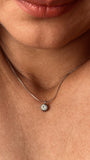 The Elara Necklace in polished stainless steel finish with clear crystal Elara charm