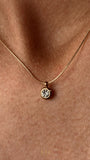 The Elara Necklace in 18K gold finish with clear crystal Elara charm