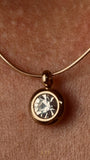 The Elara Necklace in 18K gold finish with clear crystal Elara charm