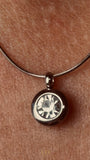 The Elara Necklace in polished stainless steel finish with clear crystal Elara charm
