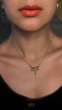 Gold Queen Necklace with Emerald Green crystal centerpiece and suspended metal details