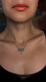 Silver-tone Queen Necklace with Emerald Green crystal centerpiece and suspended details