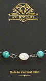 The Shoreline Bracelet in Polished Stainless Steel with shell and turquoise beads